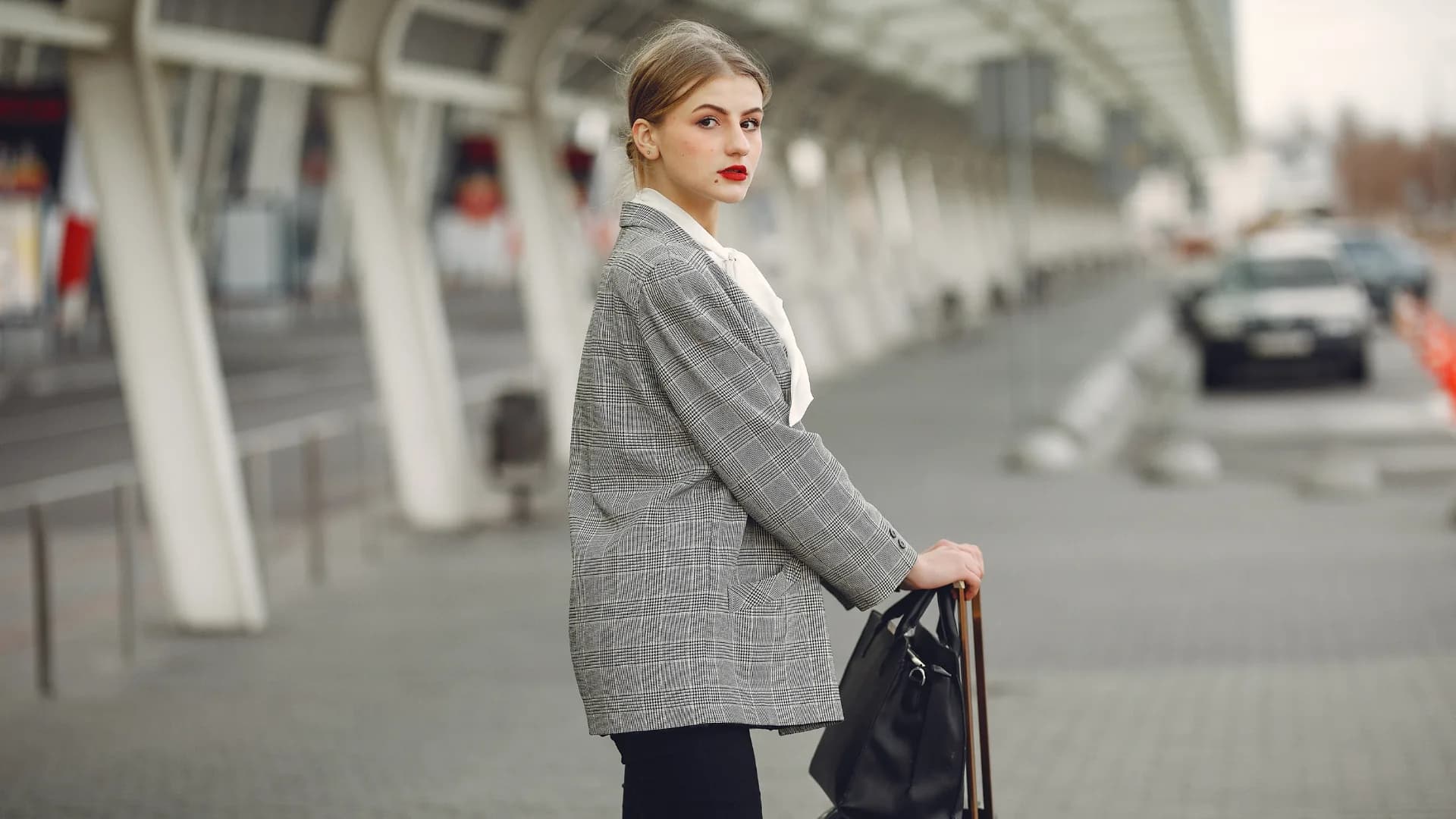 Private airport transfer at Madrid-Barajas, driver meeting a traveler