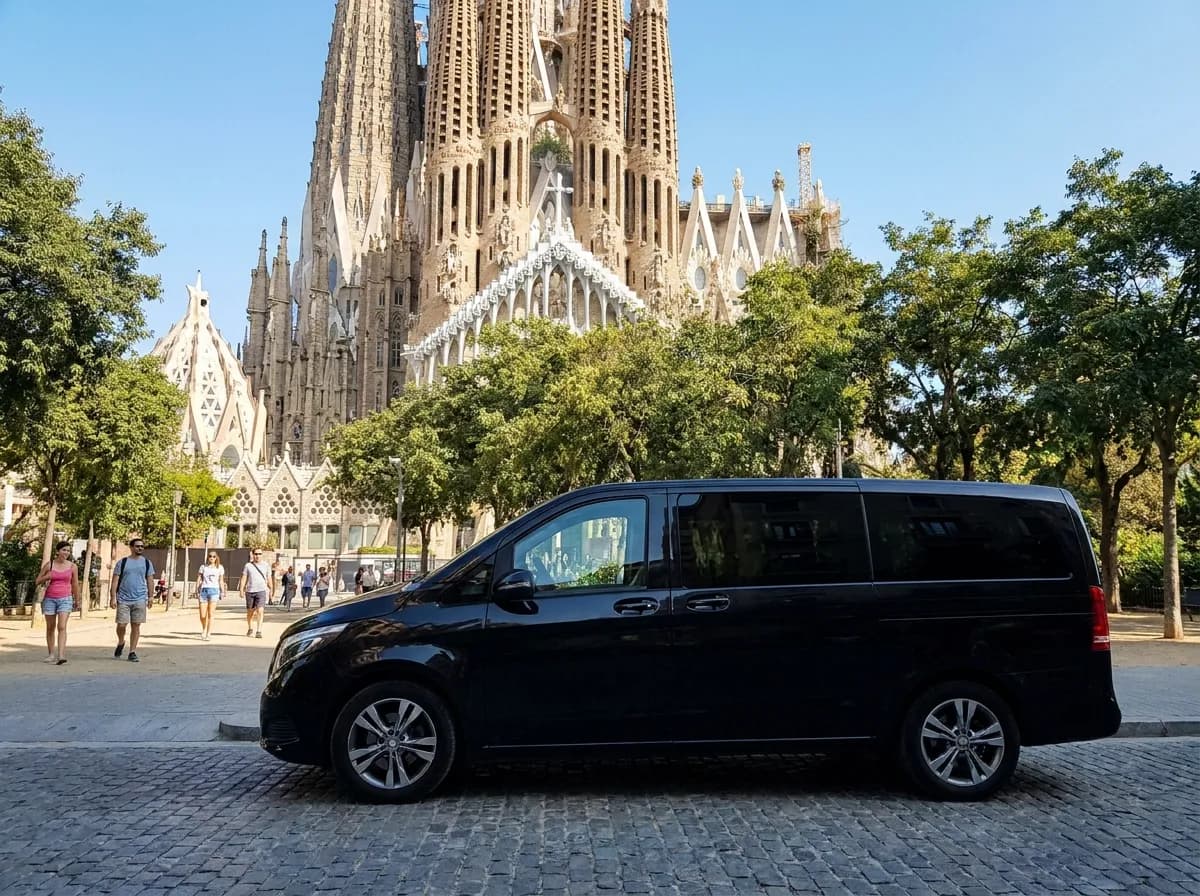 Private transfer van near the Sagrada Família in Barcelona, a private intercity route from Madrid